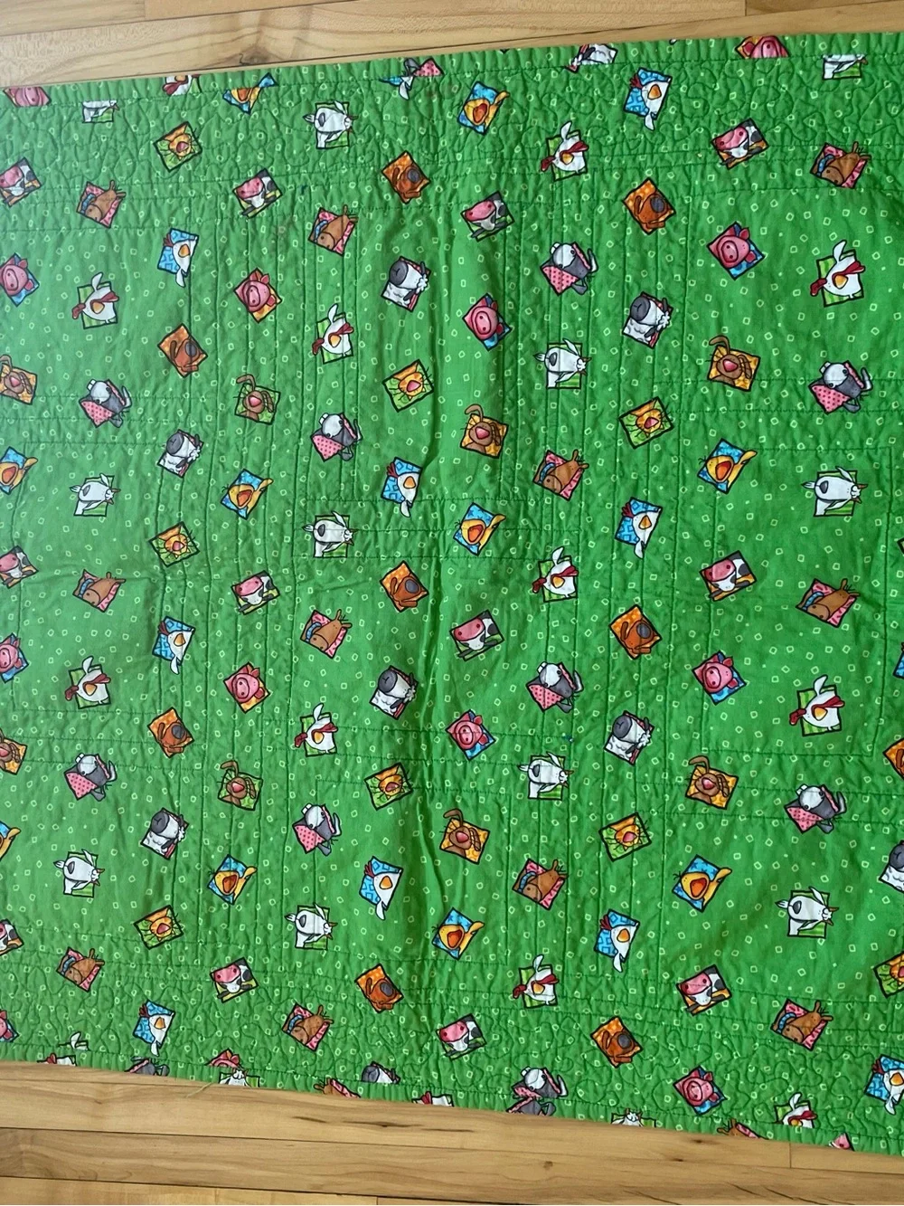 Quack, Moo, Oink quilt with farm animals and 'Quack, Moo, Oink'
